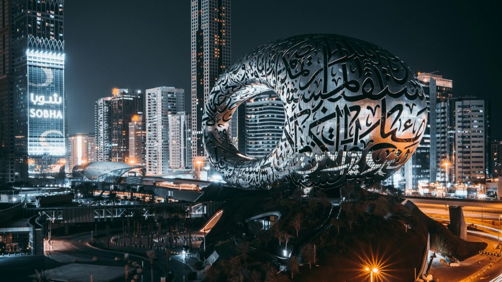 Dubai skyline at night with the Museum of the Future, for a guide to the best social media marketing companies in Dubai