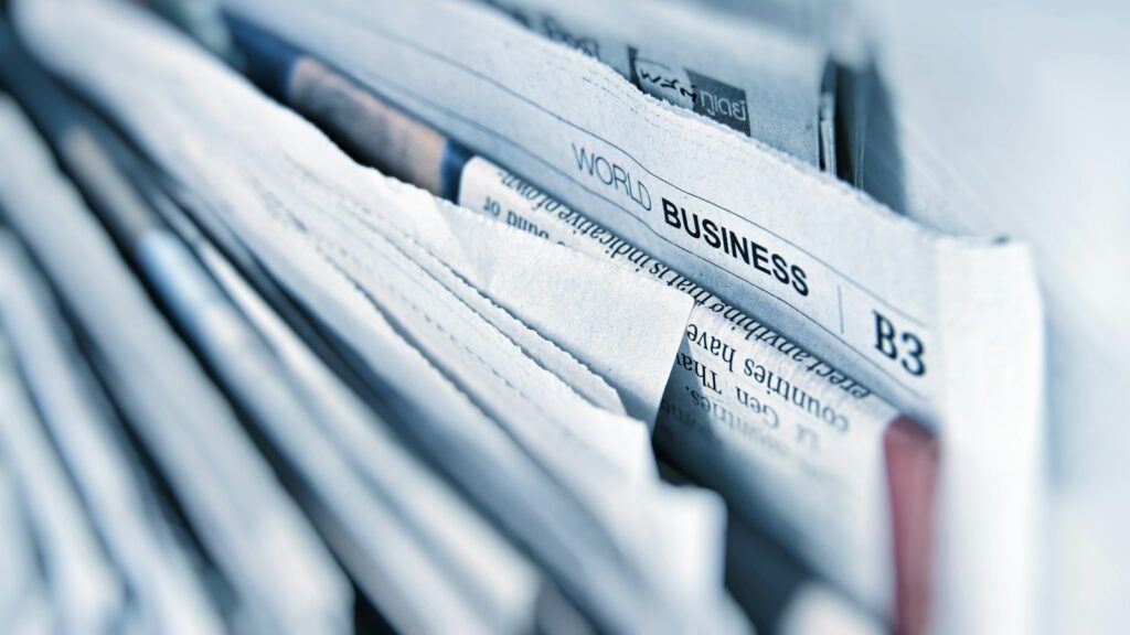 Business newspaper pages, for a guide to press release distribution in the UAE